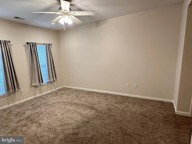 carpeted empty room with ceiling fan