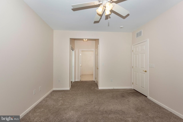 interior space featuring ceiling fan