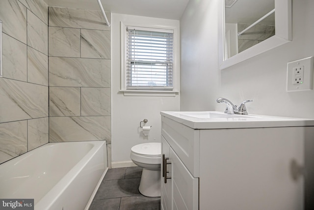 full bathroom featuring tile patterned floors, tiled shower / bath, vanity, and toilet