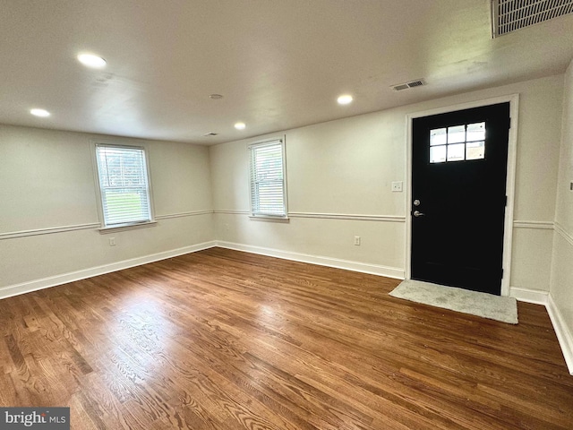 entryway with hardwood / wood-style flooring