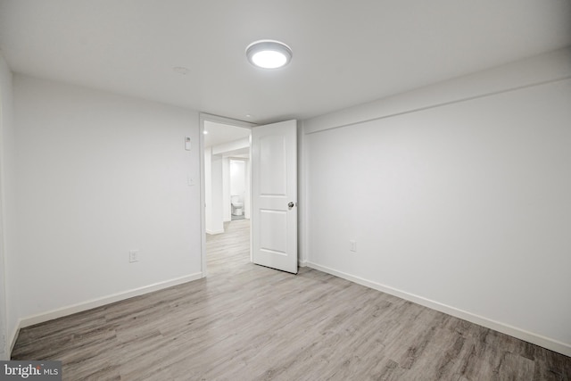 unfurnished bedroom featuring light wood-type flooring