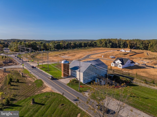 birds eye view of property featuring a rural view