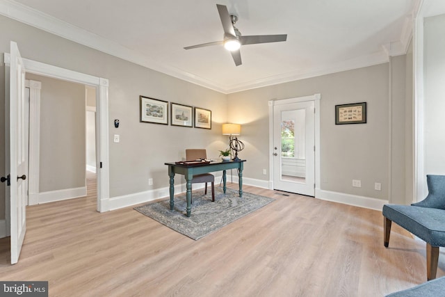 office featuring ceiling fan, ornamental molding, and light hardwood / wood-style floors