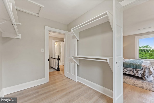 hallway featuring light wood-type flooring