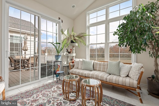 sunroom / solarium with lofted ceiling and plenty of natural light