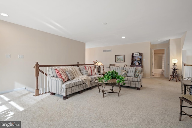 living room with light colored carpet