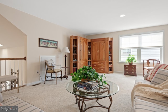 living room with light colored carpet