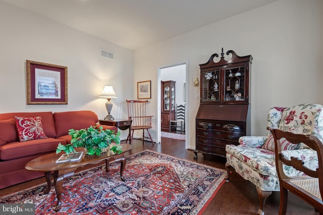 living room with dark wood-type flooring