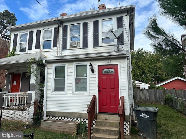 view of front of home featuring cooling unit