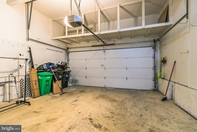 garage featuring a garage door opener