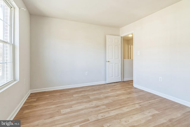 empty room with light wood-type flooring