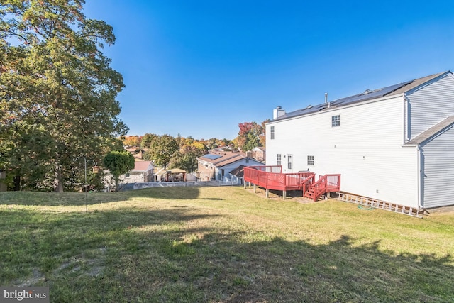 view of yard featuring a deck