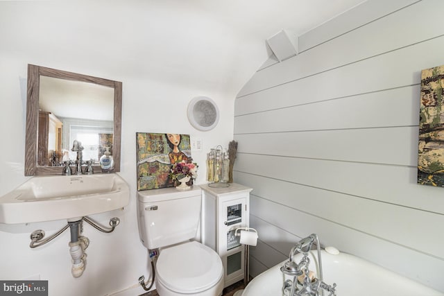 bathroom featuring sink and toilet