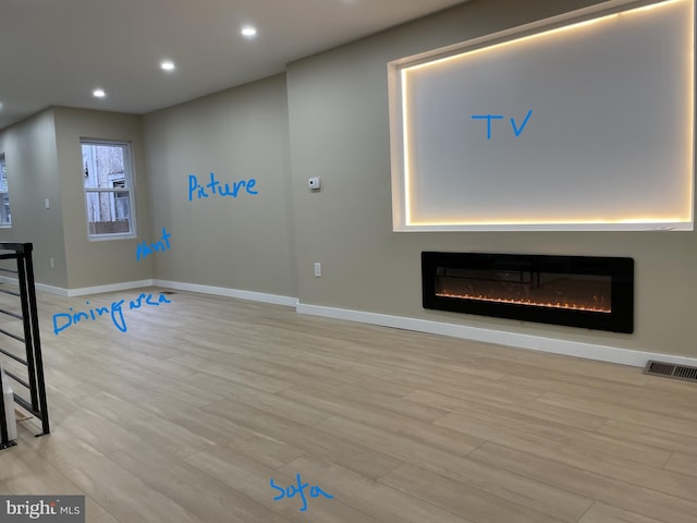 living room featuring light wood-type flooring