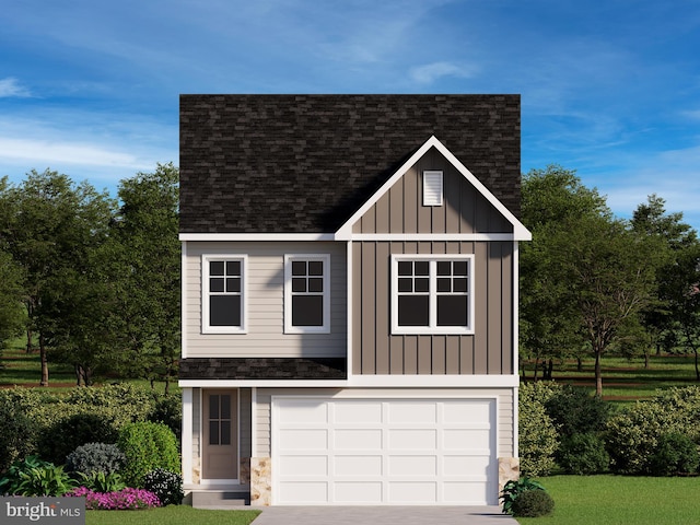 view of front of home featuring a garage and a front lawn