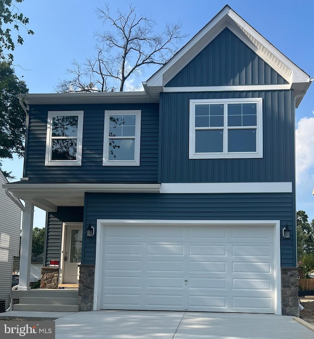 view of front of property with a garage