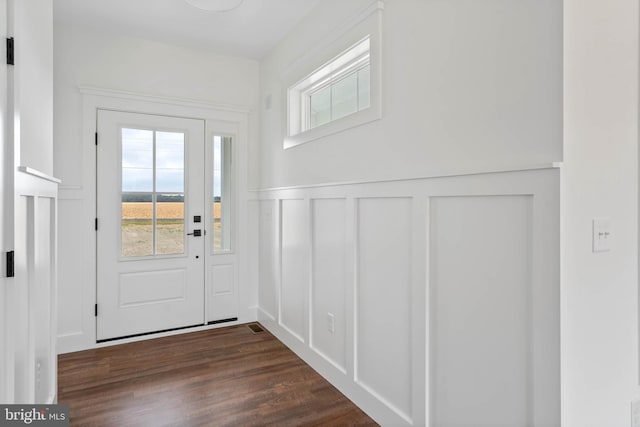 doorway to outside featuring dark hardwood / wood-style flooring