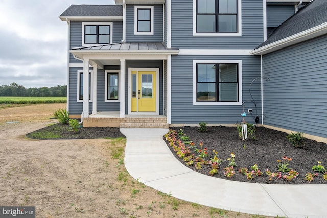 entrance to property with covered porch