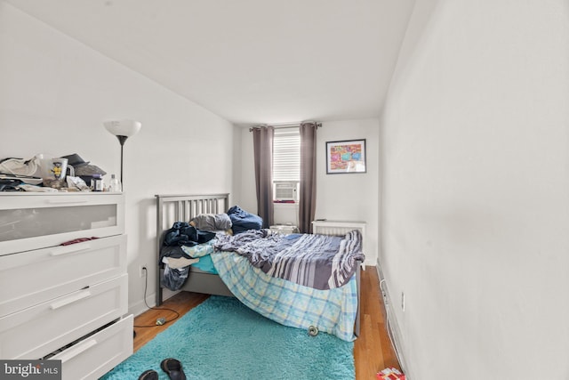 bedroom with light hardwood / wood-style floors