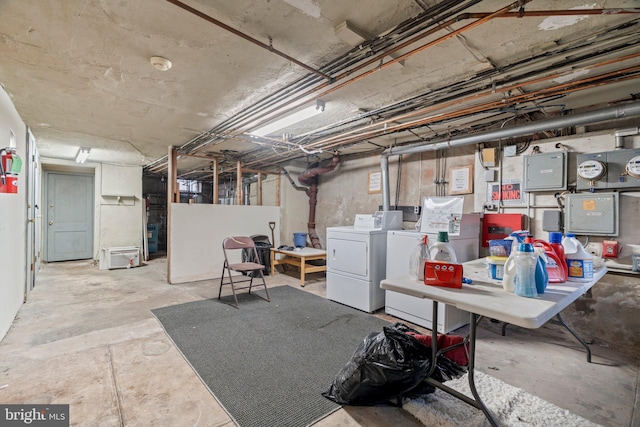 basement with separate washer and dryer