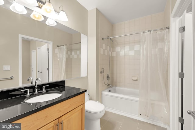 full bathroom featuring vanity, toilet, tile patterned floors, and shower / bath combination with curtain