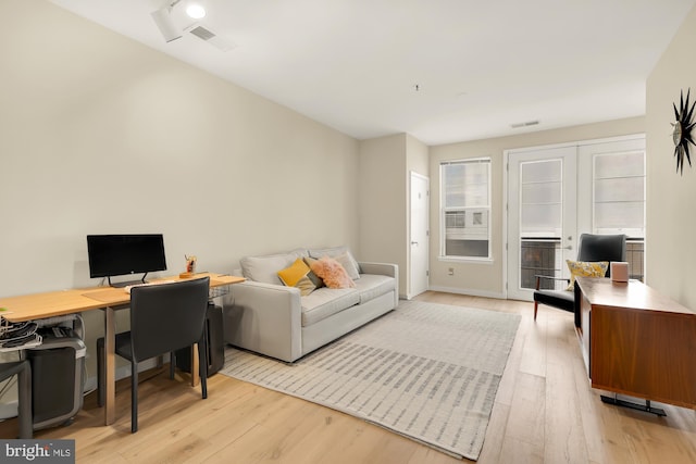 living room featuring light hardwood / wood-style floors