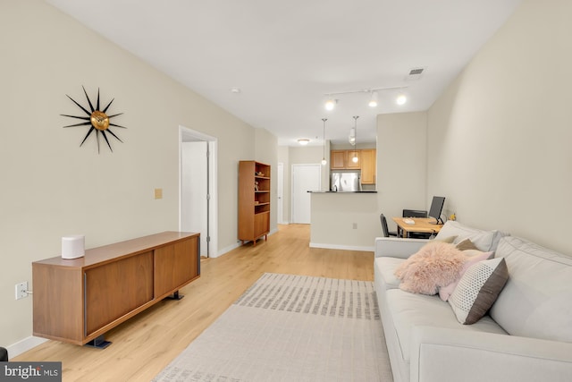 living room with light wood-type flooring