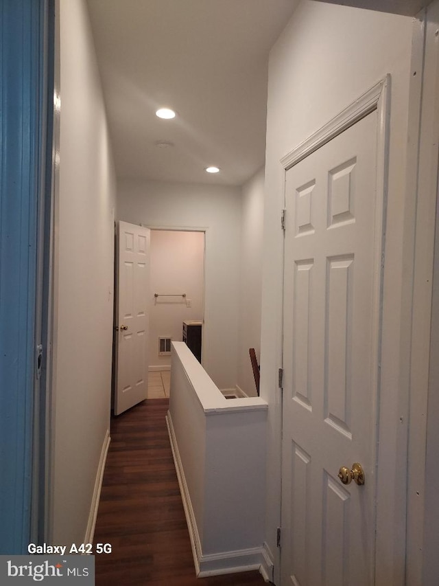 hall featuring dark hardwood / wood-style flooring