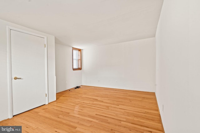 spare room with light wood-type flooring