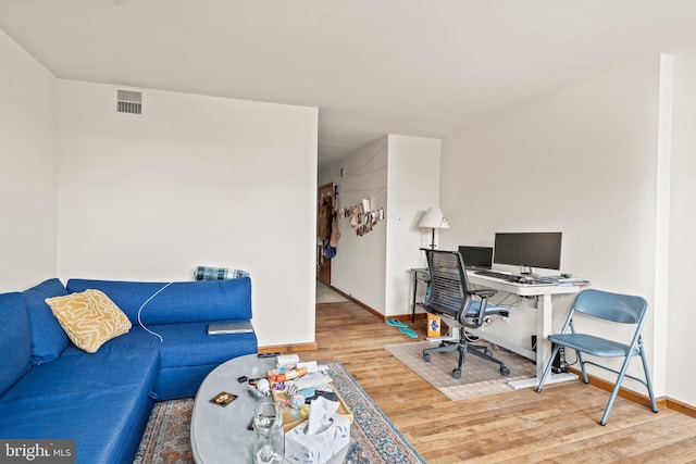 home office featuring wood-type flooring