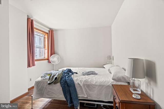 bedroom featuring dark wood-type flooring