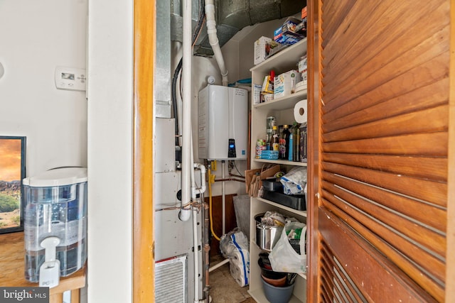 utility room with water heater