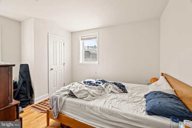 bedroom featuring wood-type flooring