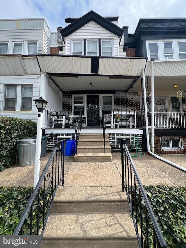 exterior space featuring covered porch