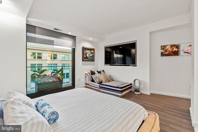 bedroom featuring hardwood / wood-style flooring