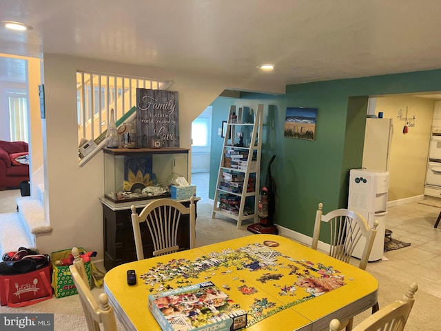 dining area with carpet floors