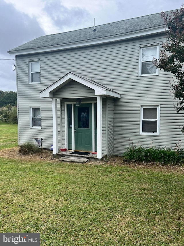 exterior space with a front lawn