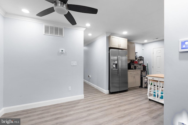 kitchen with stainless steel refrigerator with ice dispenser, crown molding, ceiling fan, and light hardwood / wood-style flooring