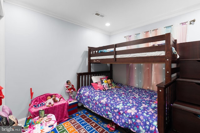 bedroom with crown molding