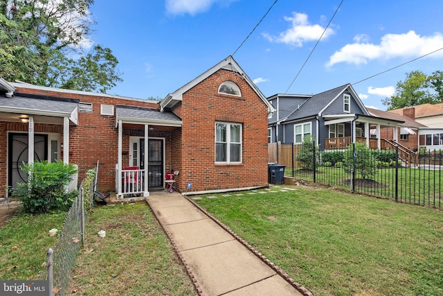 view of front of property with a front lawn