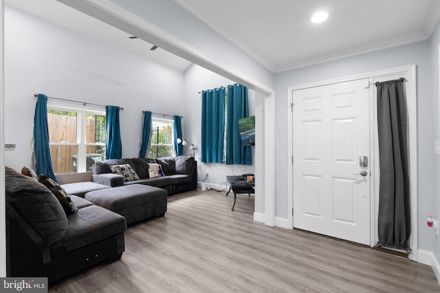 interior space with crown molding and hardwood / wood-style floors