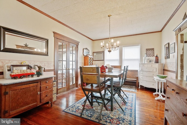 dining space with plenty of natural light, french doors, and dark hardwood / wood-style floors