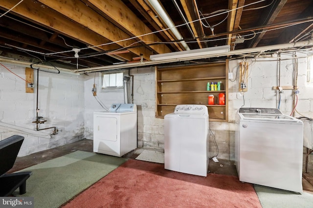 basement with separate washer and dryer