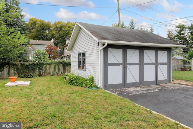 garage with a lawn