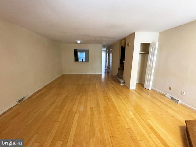 spare room with light wood-type flooring