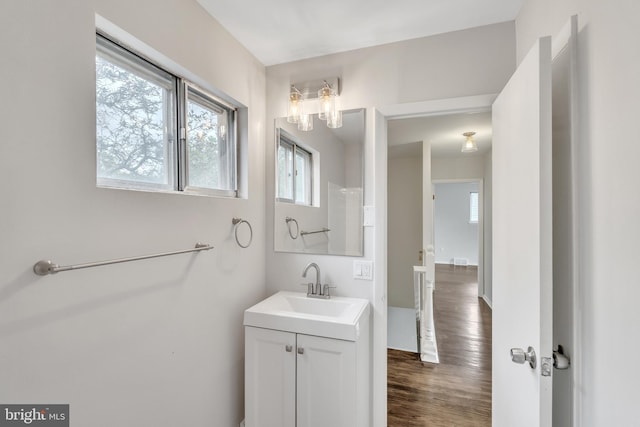 bathroom featuring vanity and hardwood / wood-style flooring