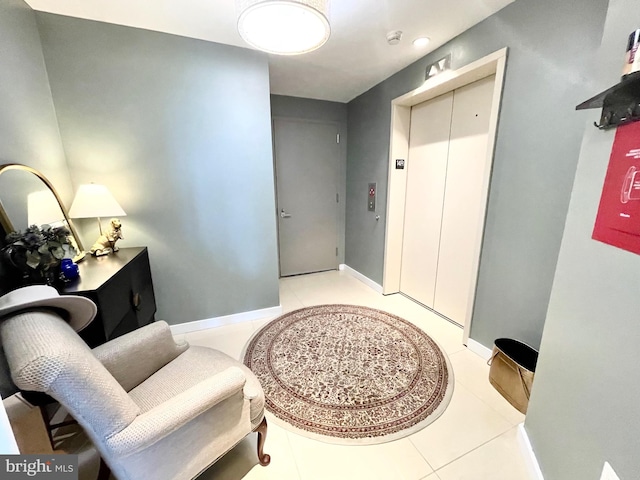 living area with light tile patterned floors