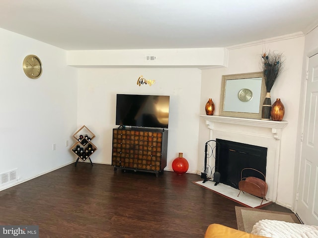 living room with dark hardwood / wood-style floors