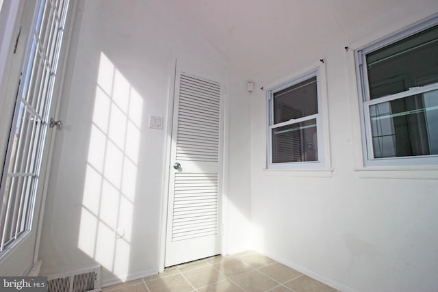 interior space featuring light tile patterned floors