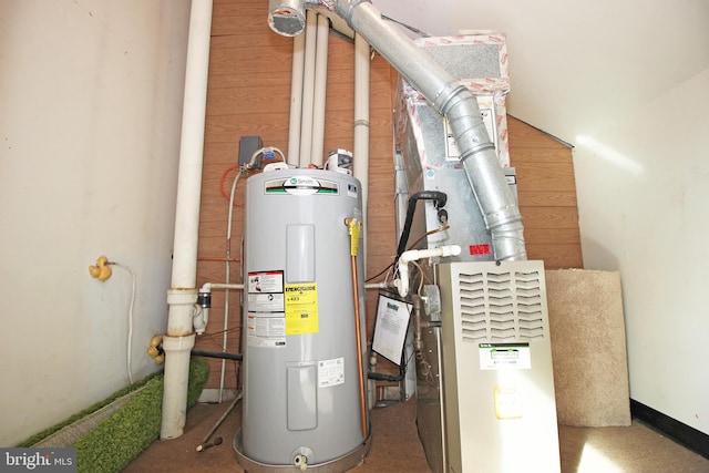 utility room with electric water heater